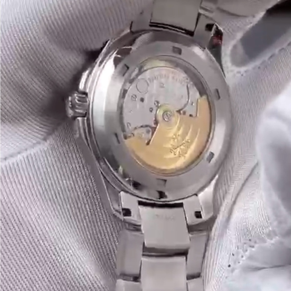 Patek Philippe Silver and Gold Watch